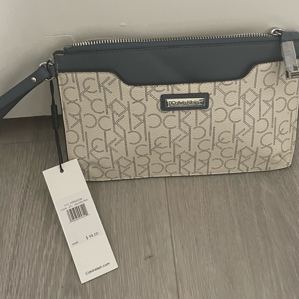 Calvin Klein blue & white wristlet